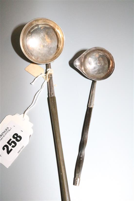 Two silver toddy ladles(-)
